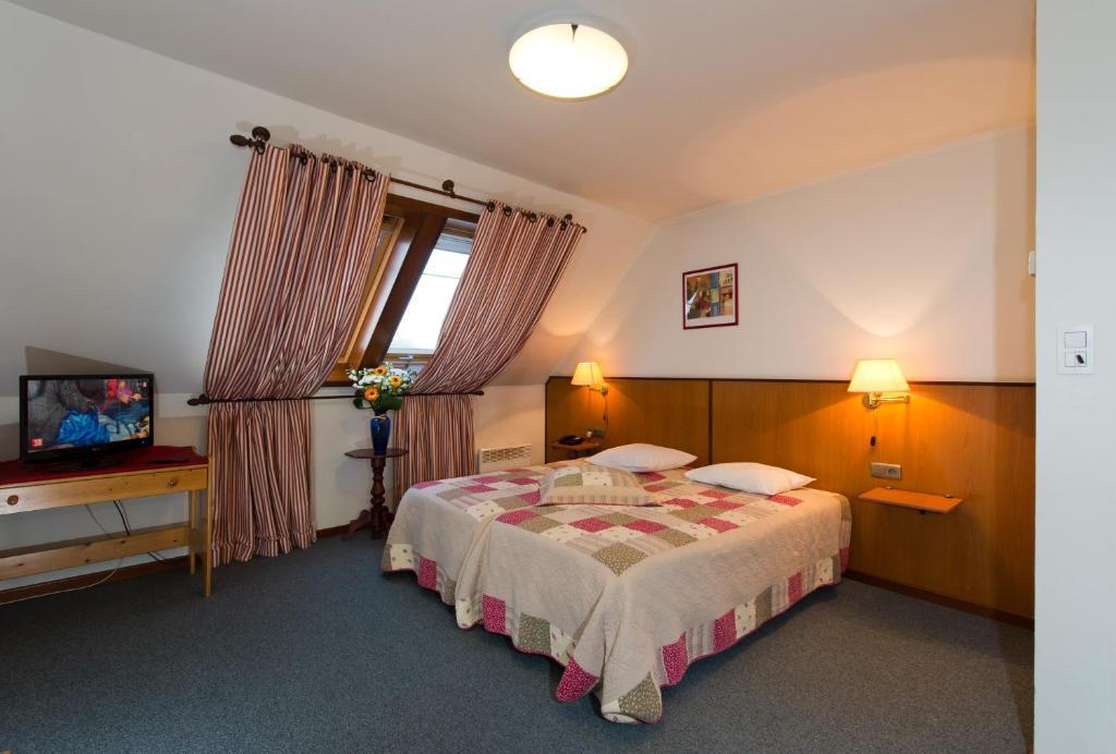 Auberge Le XIX Eme Thulin Rom bilde